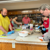 Clients of The Gathering Place team up to cook chicken soup and bake a diabetic sweet bread. This was followed by a lunch and learn session on Diabetes and Healthy Food Choices.