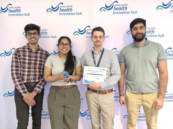 A photo of Connor and his team