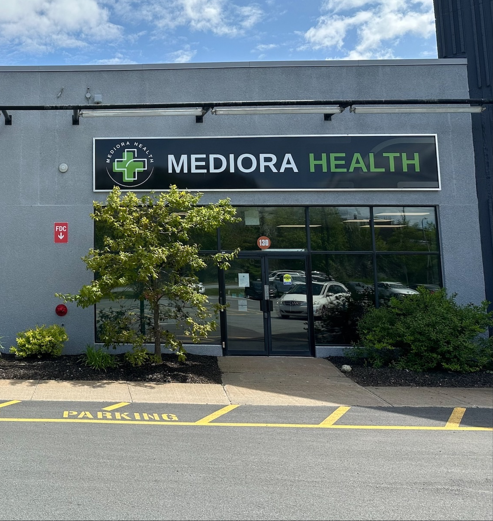 Front facing image of building with Mediora Health signage.