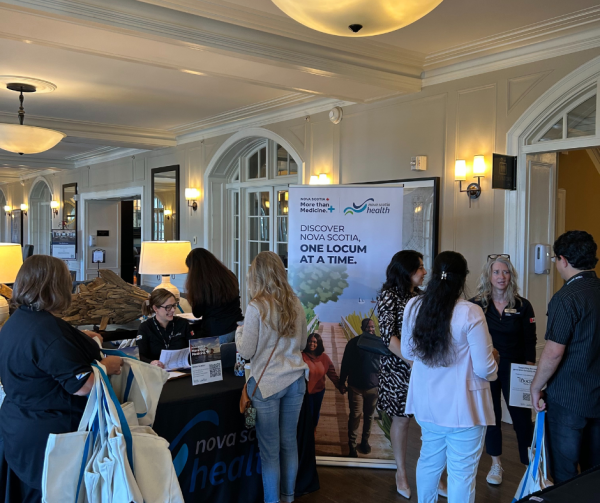 People gathered around booth