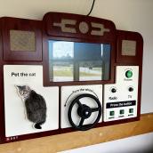 Busy Boards have retro designs to invite patients to engage in activities they can easily do, such as petting the cat with a surprising outcome, to driving along leafy country roads.