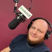 Jared McNeil, prideHealth community liaison recording at the GOProud studio in Lunenberg.