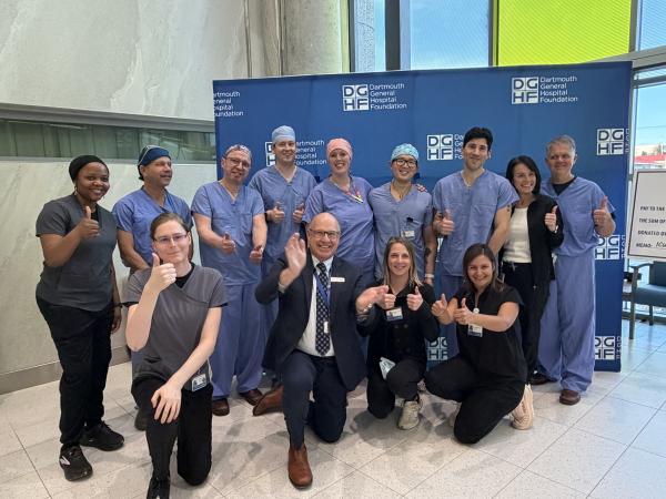 Team members from Dartmouth General Hospital gather to celebrate breaking their own Atlantic Canada joint replacement record