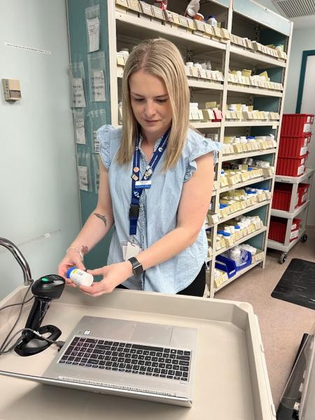 NSH pharmacist at computer