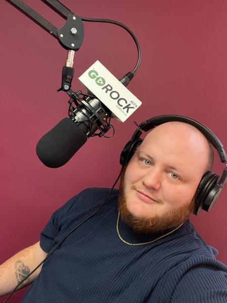 Jared McNeil, prideHealth community liaison recording at the GOProud studio in Lunenberg.