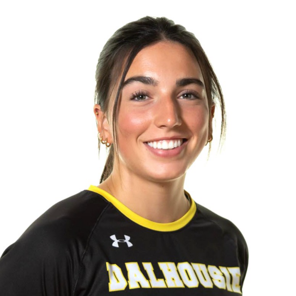 A headshot of a young woman wearing a black and yellow volleyball uniform.