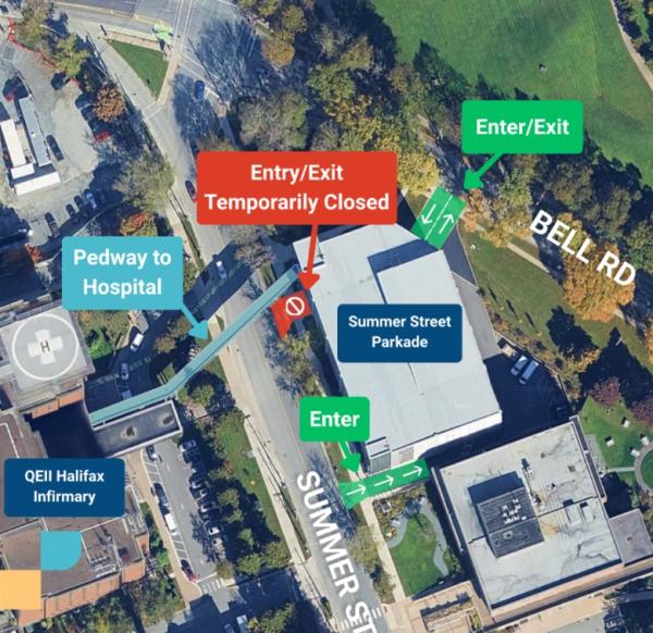 Map of roads and buildings indicating entrance and exits to a hospital facility during a construction period.