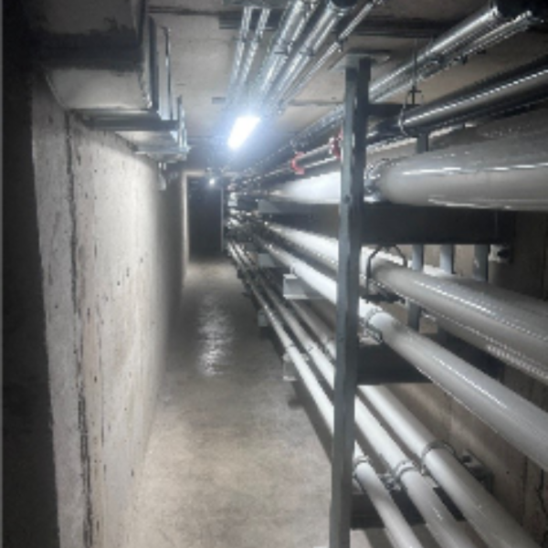View looking down the new utility tunnel walkway